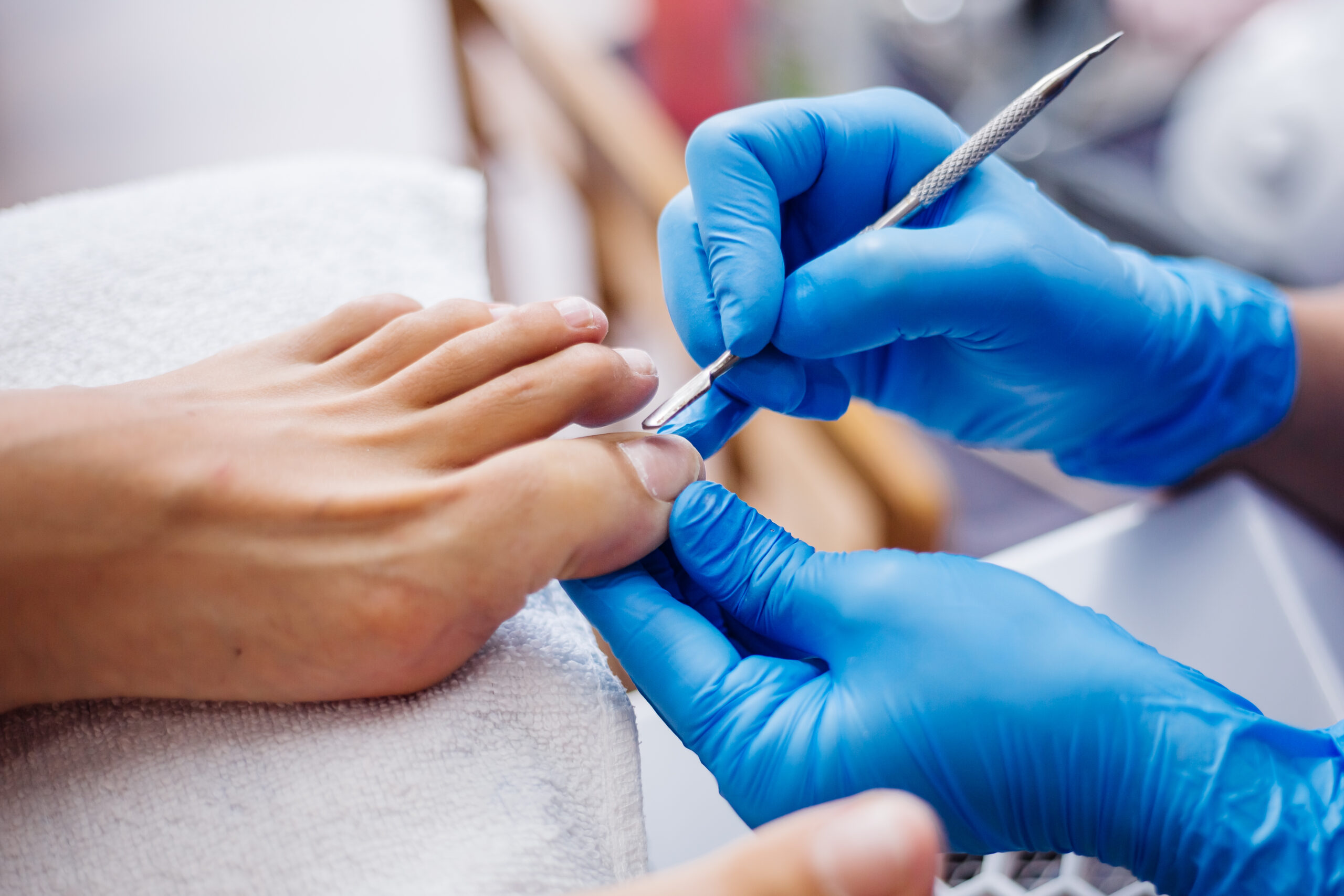 Pedicure Process Home Salon Pedicure Foot Care Treatment Nail Process Professional Pedicures Master Blue Gloves Make Pedicure1 Scaled